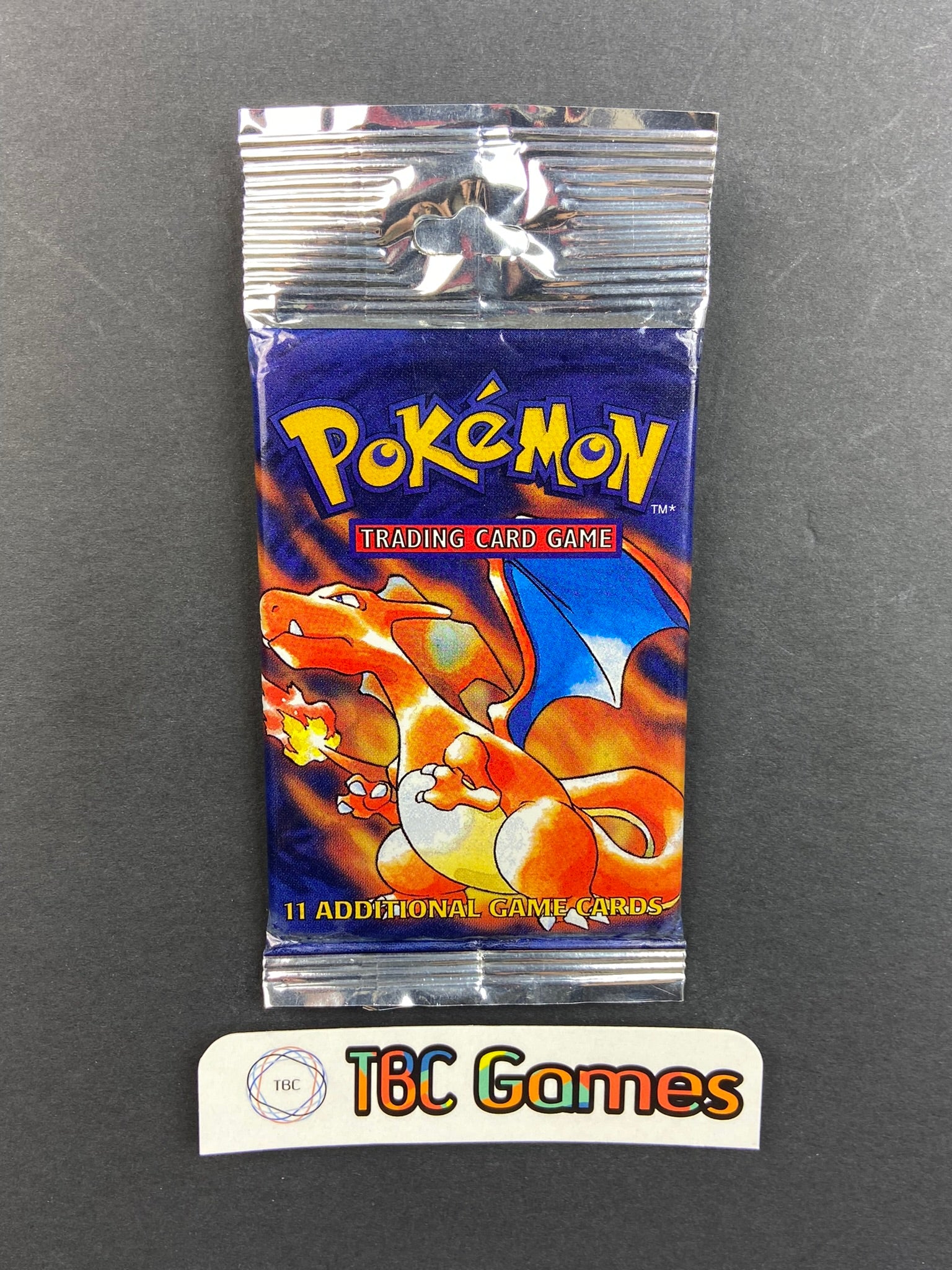 Pokemon TCG: Base Set Unlimited Booster Pack Long Crimp (Charizard) Pokemon TCG: Base Set Unlimited Booster Pack Long Crimp (Charizard)