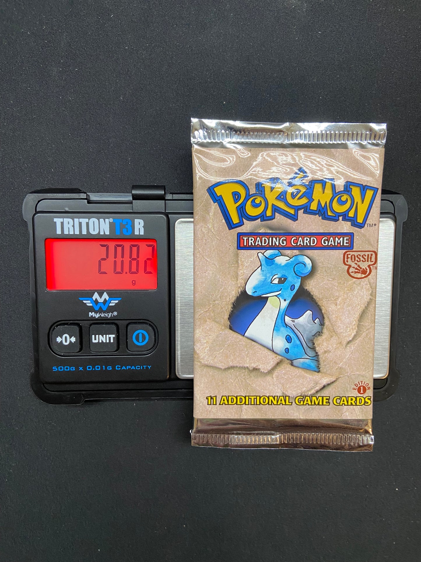 Pokemon TCG: Fossil 1st Edition Booster Pack (Lapras)