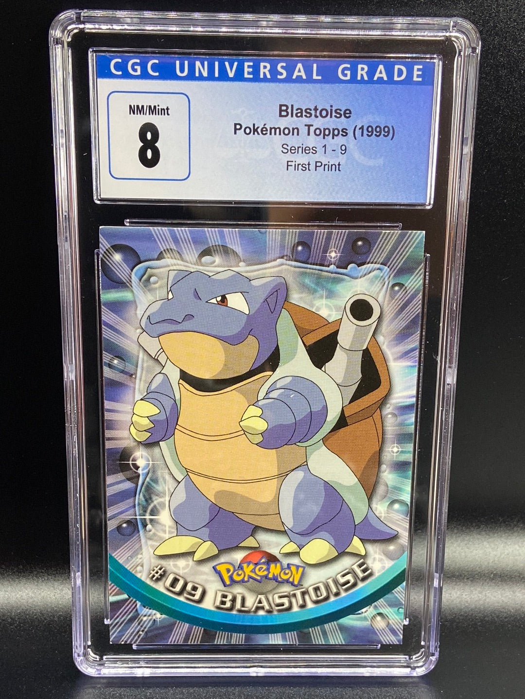 Blastoise Topps Series 1 First Print #9 CGC 8 TBC Games Blastoise Topps Series 1 First Print #9 CGC 8 TBC Games