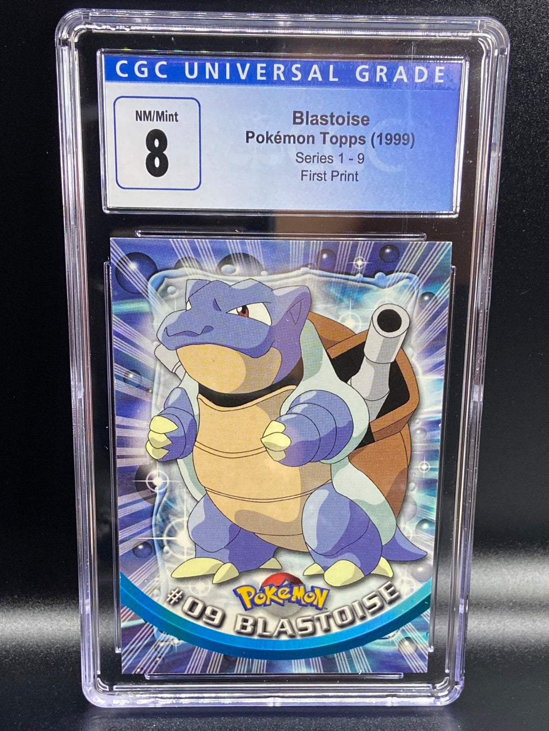 Blastoise Topps Series 1 First Print #9 CGC 8 TBC Games Blastoise Topps Series 1 First Print #9 CGC 8 TBC Games