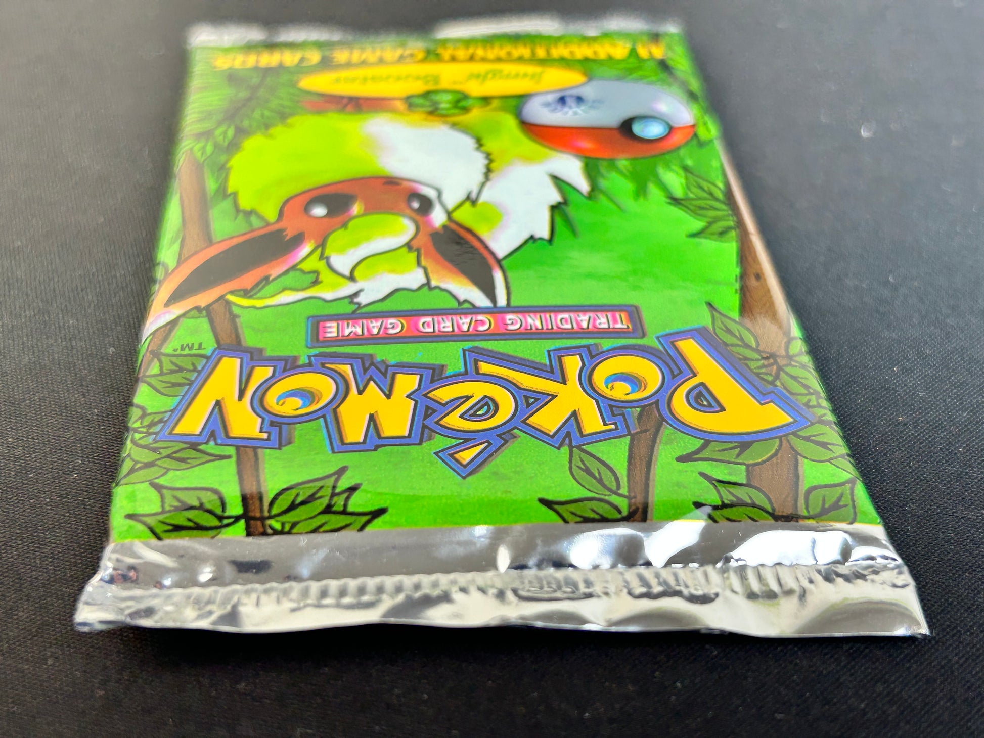 Pokemon TCG: Jungle 1st Edition Booster Pack (Flareon) Pokemon TCG: Jungle 1st Edition Booster Pack (Flareon)