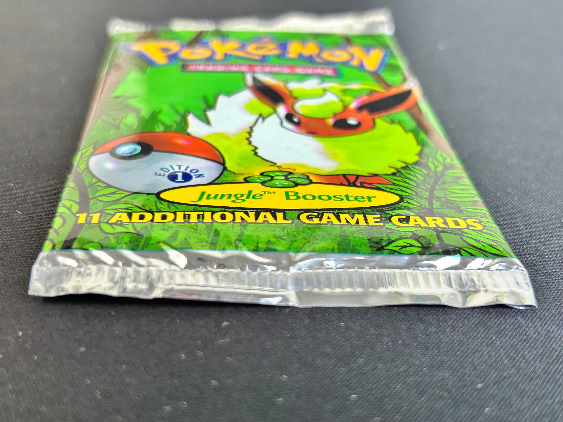 Pokemon TCG: Jungle 1st Edition Booster Pack (Flareon) TBC Games Pokemon TCG: Jungle 1st Edition Booster Pack (Flareon) TBC Games