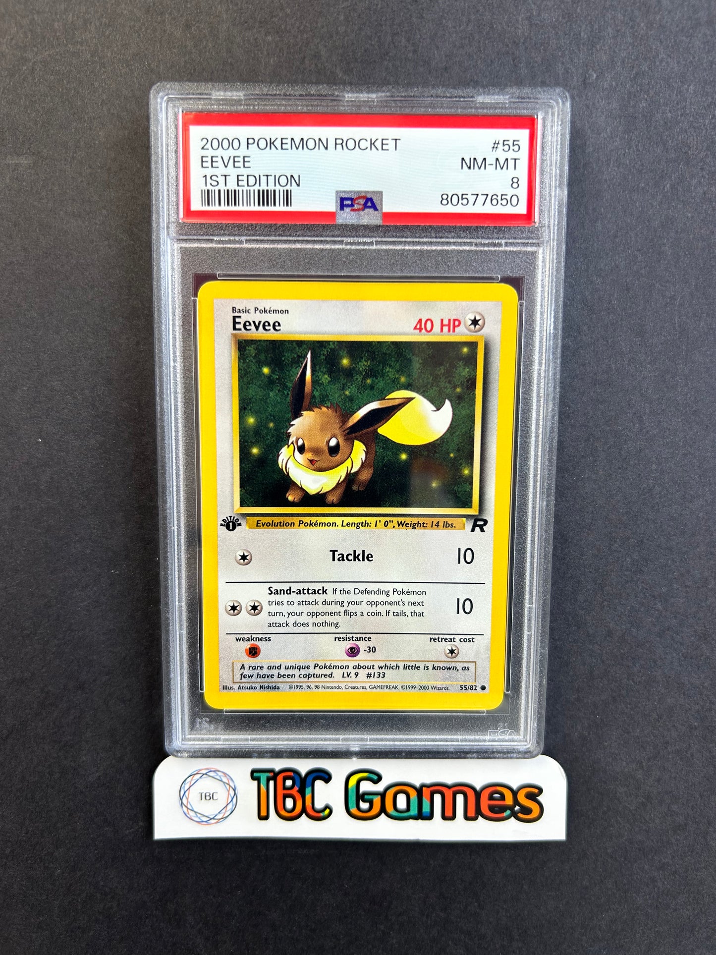 Eevee Team Rocket 1st Edition #55 PSA 8