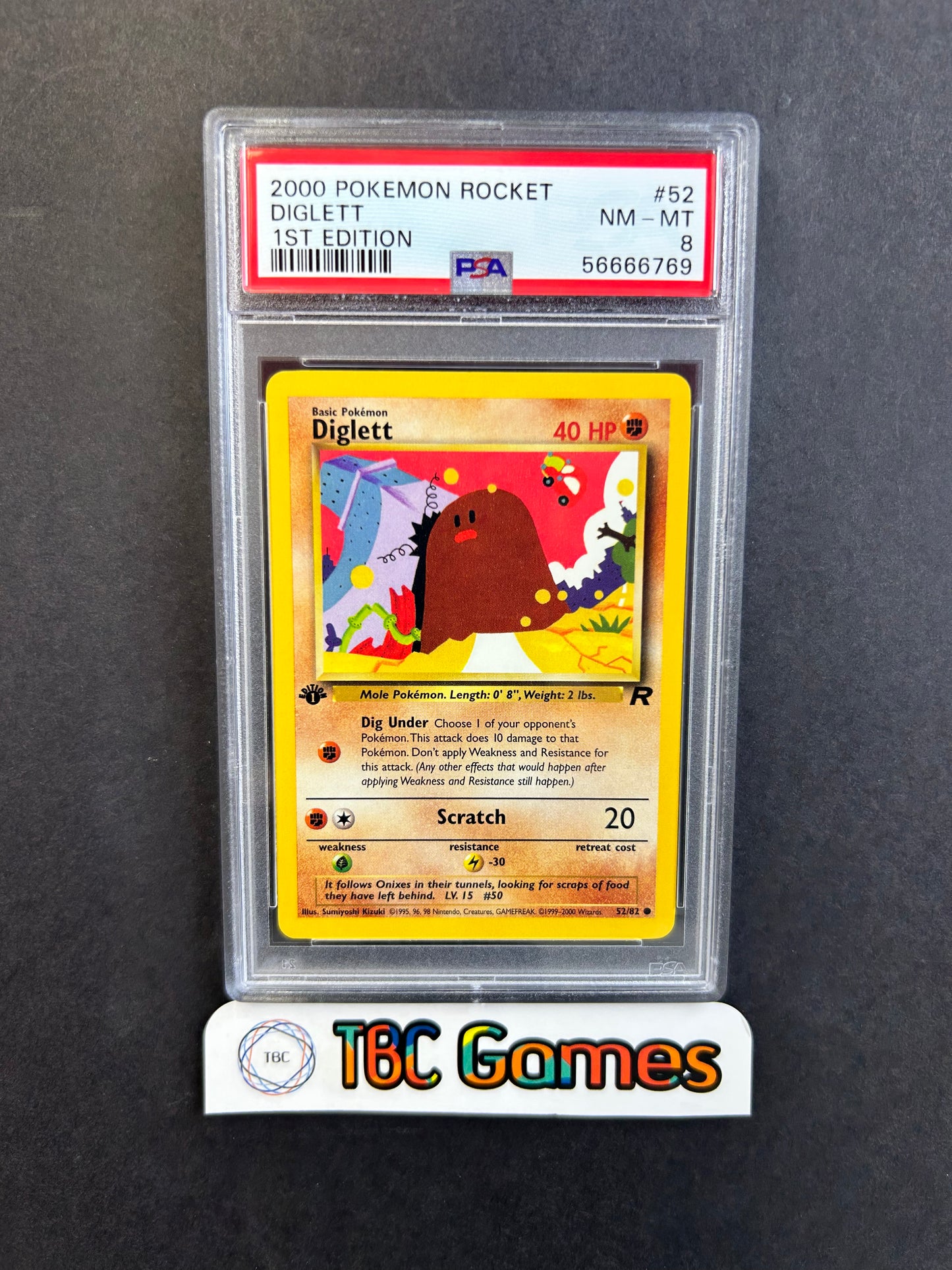 Diglett Team Rocket 1st Edition #52 PSA 8