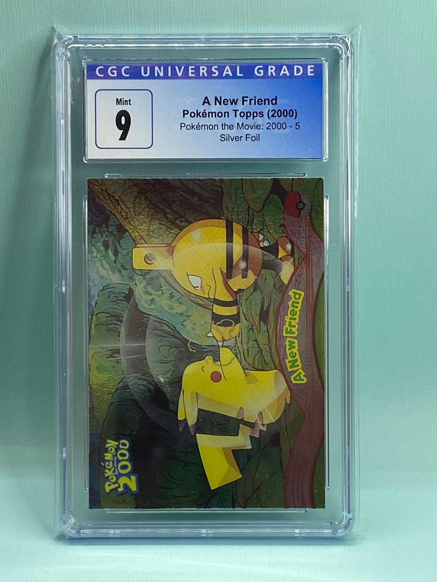 A New Friend Topps Pokemon the Movie 2000 Pikachu Elekid Foil CGC 9 TBC Games A New Friend Topps Pokemon the Movie 2000 Pikachu Elekid Foil CGC 9 TBC Games