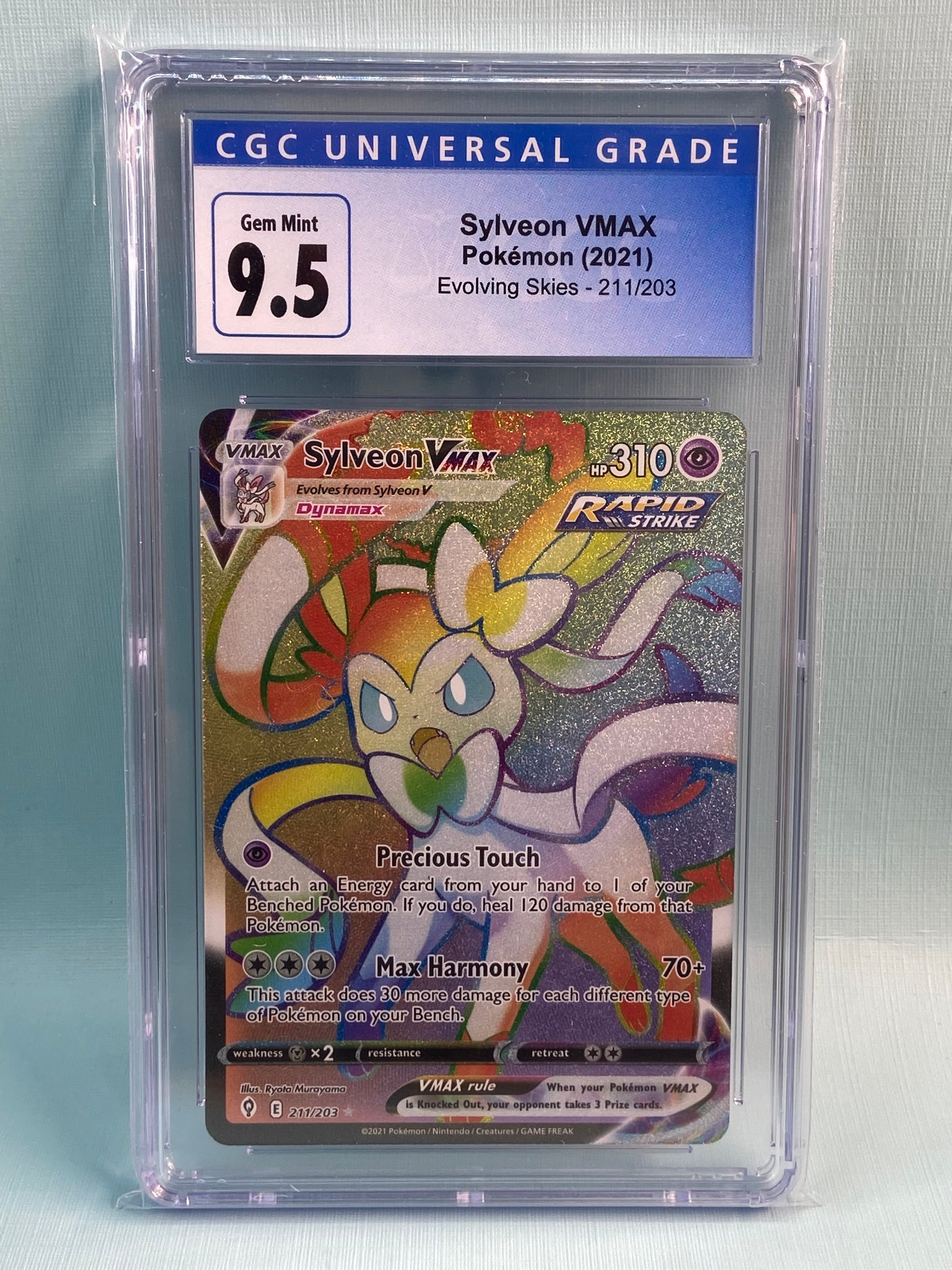 Sylveon VMAX Evolving Skies Rainbow 211/203 CGC 9.5 Sylveon VMAX Evolving Skies Rainbow 211/203 CGC 9.5