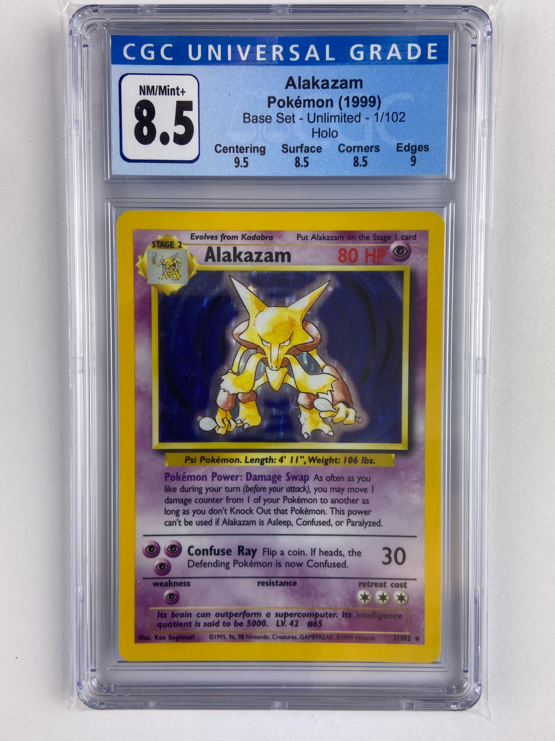 Alakazam Base Set Holo 1/102 Subgrades CGC 8.5 TBC Games Alakazam Base Set Holo 1/102 Subgrades CGC 8.5 TBC Games